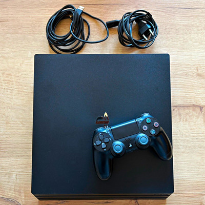 Sony PlayStation 4 Pro 1TB Schwarz PAL CUH-7216B inkl. DualShock 4