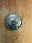 1 oz fine silver one dollar coin, 4 half dollar coins 1971 t0 1978