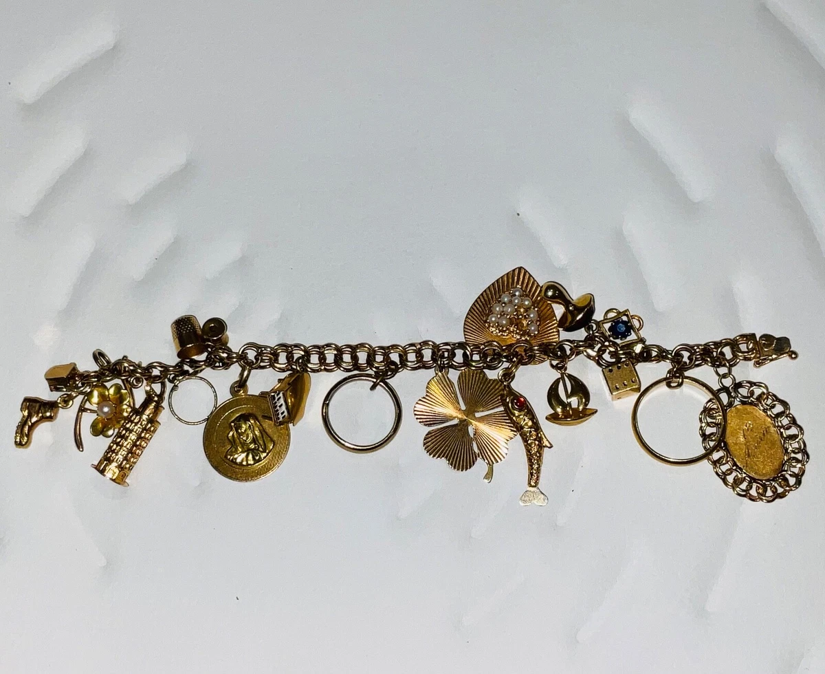 Tiffanys 1950s Charm Bracelet 59.53g 14 22 karat Gold Ruby