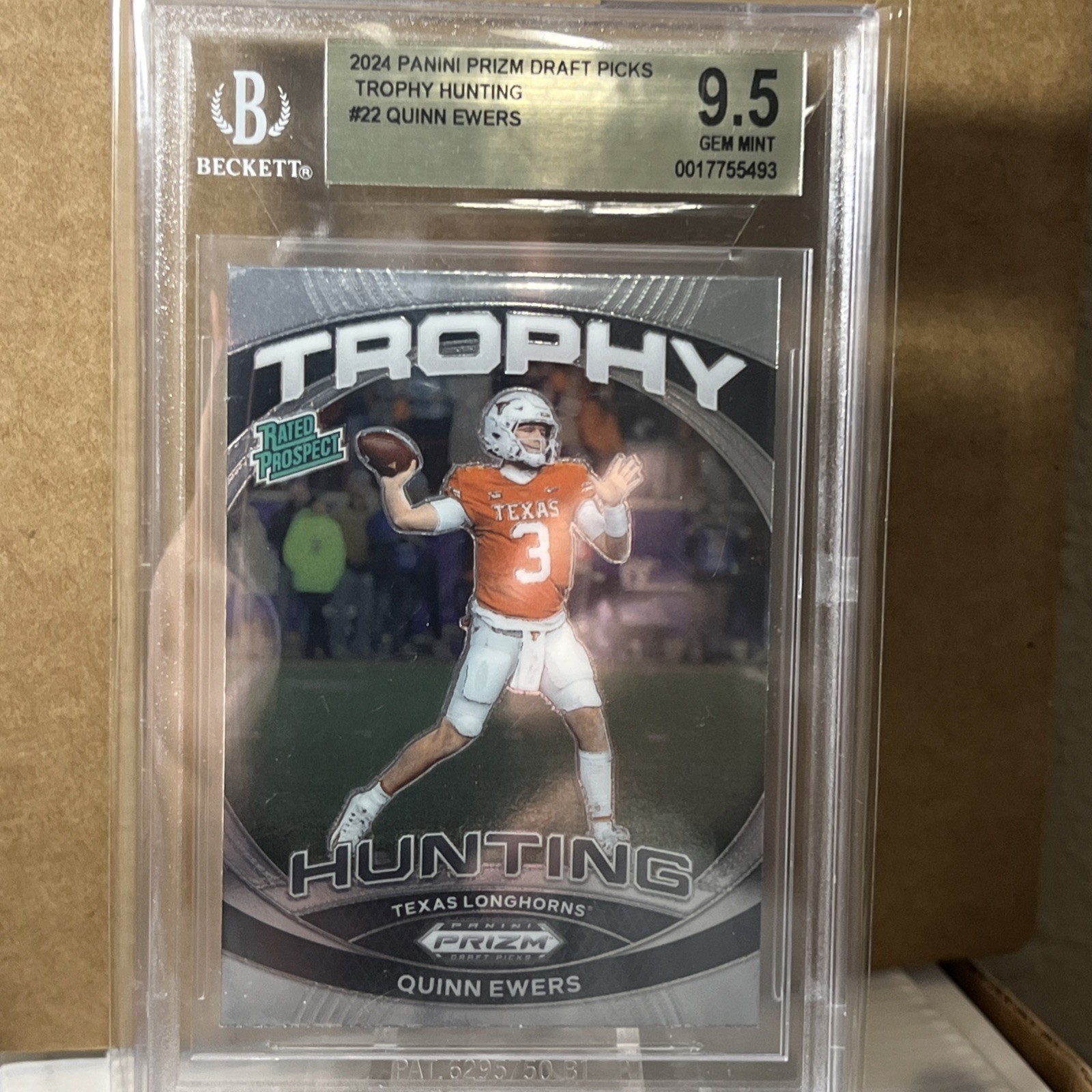 2024 Panini Prizm Draft Picks - Trophy Hunting Quinn Ewers (RC) BGS 9.5 GMMNT