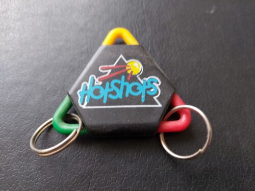 A COLLECTIBLE HOT SHOPS DOUBLE KEYRING IN VERY GOOD CONDITION TO KEEP. PRE-OWNED