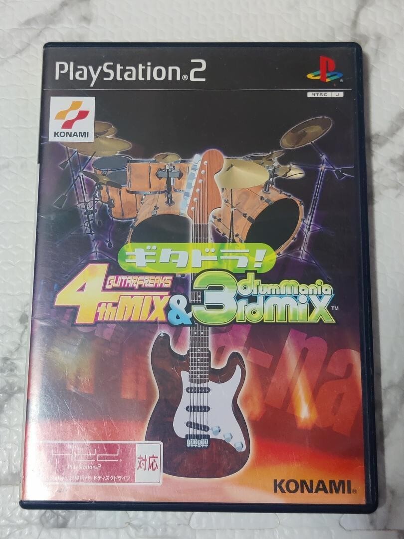 GuitarFreaks 4th & DrumMania 3rd Guitar Freaks PS2 GUITAR FREAKS