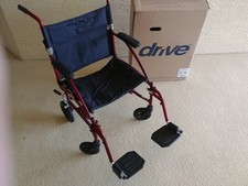 Drive Ultralight Transport Wheelchair - Adj Leg Supports and Hand Brakes - Red