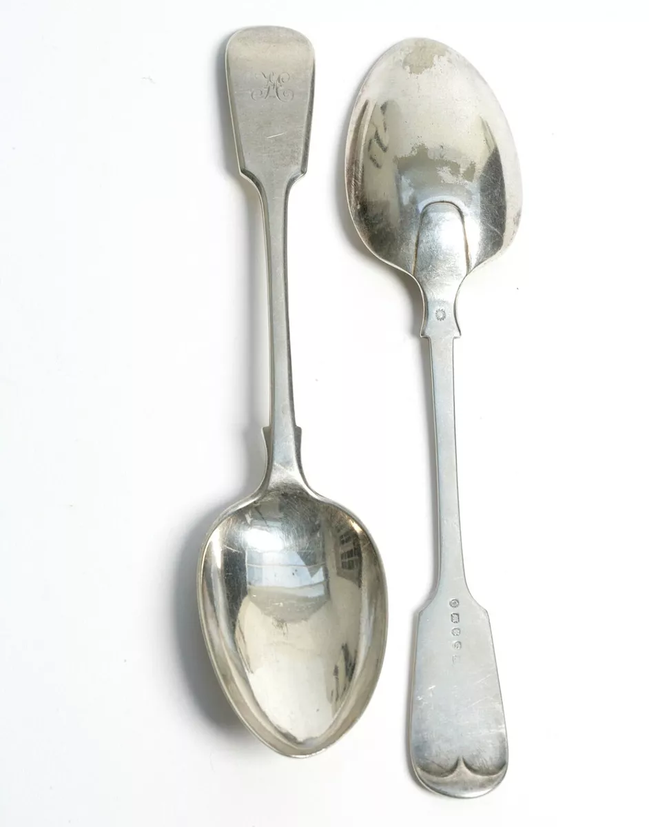 A pair of stamped silver plated serving spoon