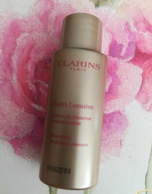 CLARINS Nutri-Lumiere Renewing Treatment Essence Toning Lotion Soften .3oz 10ml 