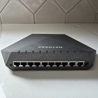 NETGEAR Nighthawk Pro SX10 GS810EMX Gaming Switch 8 port 1GbE 2 port 10G Uplinks — photo 2