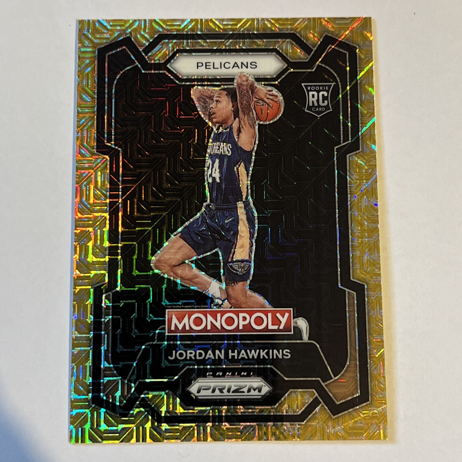 2023-24 Panini Prizm Monopoly: Gold Millionaire Shimmer #56 Jordan Hawkins #/500