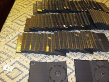 LOT OF 50 PLAYSTATION 2 OFFICIAL GAME CASES..AS IS/USED LOT-W/MEMORY CARD HOLDER