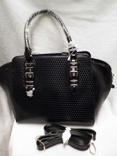 black leather with gold buckles handbag