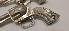 Vintage Hubley Toy Cap Guns, with holsters.