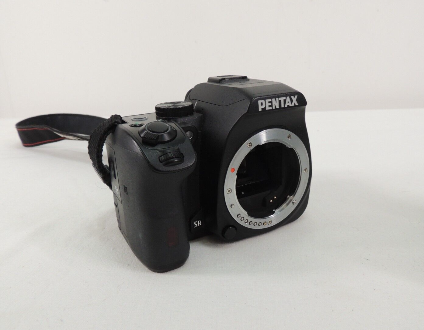 Pentax KS2 DSLR camera, 58mm prime lens, included eBay