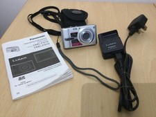 PANASONIC LUMIX DMC-FX10 6.0 MP DIGITAL CAMERA, CHARGER, 4GB SD, CASE WORKING