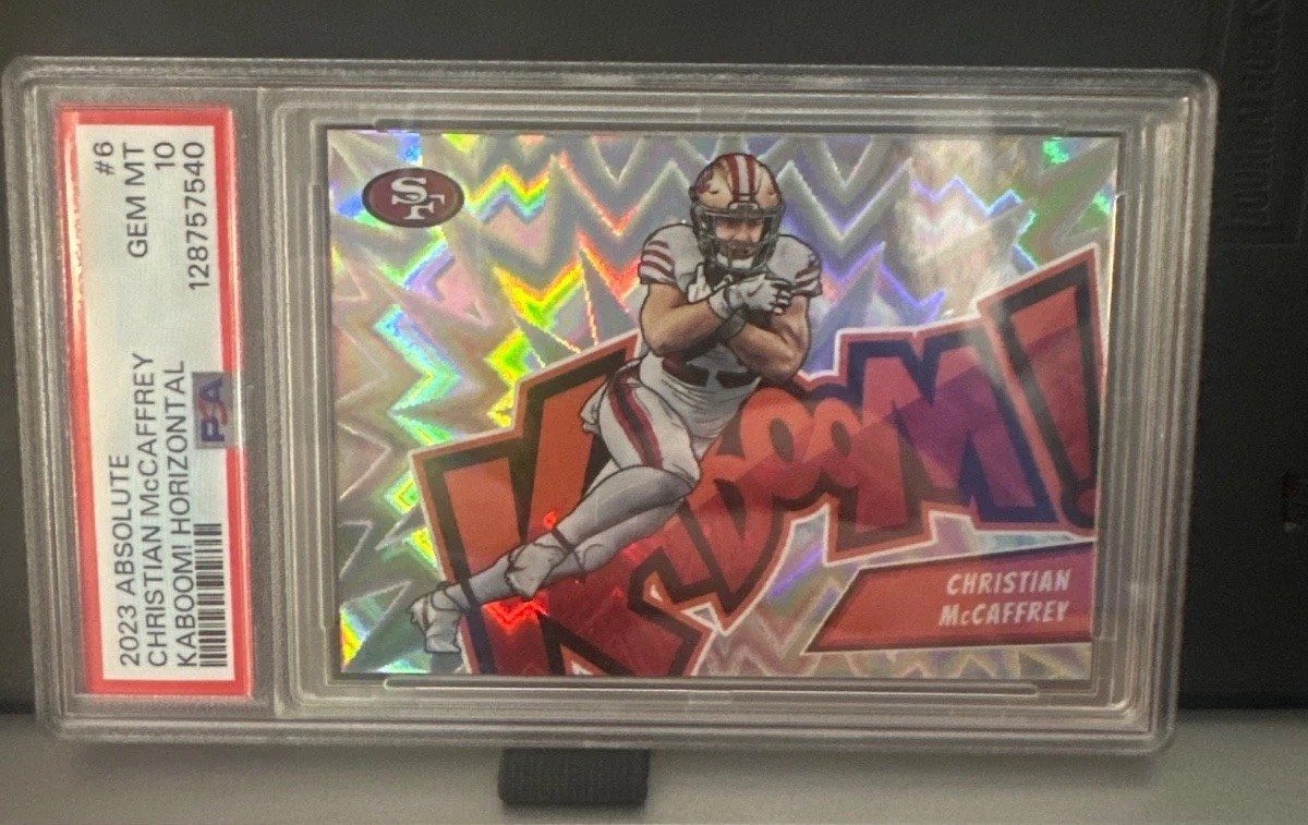 2023 Panini Absolute - Kaboom! Horizontal - Christian McCaffrey #6 49rs -PSA 10