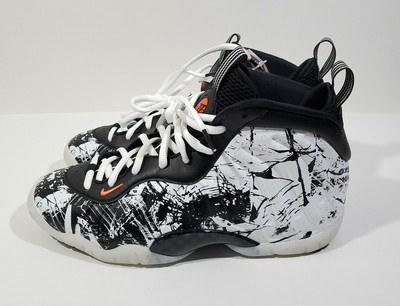 one black and one white basketball shoes