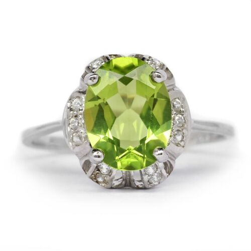 9x7mm Natural Green Peridot Ring With White Zircon in 925 Sterling Silver - Picture 1 of 2