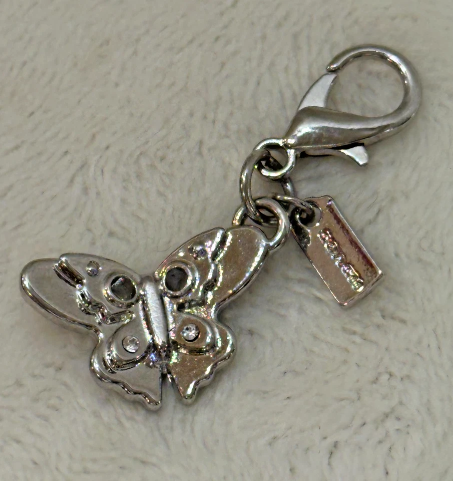 COACH ~ Mini Llavero Anillo Bolso Dije FOB Colgante ~ Mariposa Plata ~ Usado en Excelente Condición! Foto 3 de 4