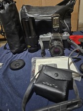 Minolta SRT 200 Chrome/Black 35mm camera With 2 Minolta Lenses,flash Case,papers