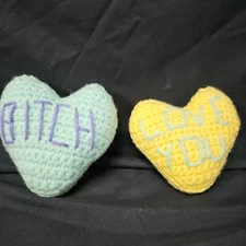 2 Hand Knitted Hearts Handheld Mini Pillows (Love You And Bitch)