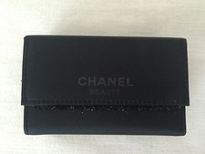 CHANEL TRAVEL BLACK 3 LIPSTICK CASE with SHIMMERING ACCENT.
