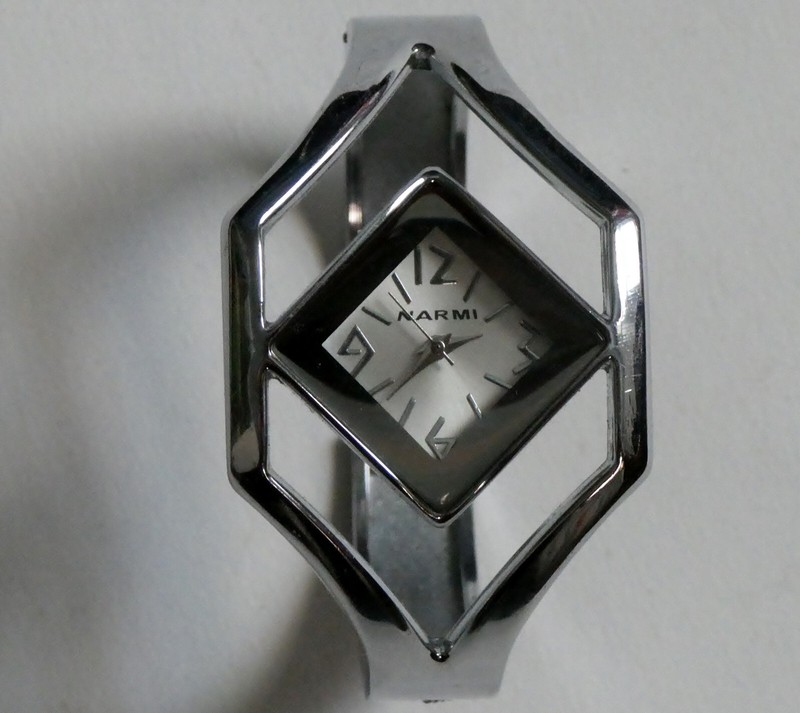 Unusual Narmi watch, stainless steel.