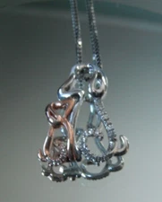 1/15 CT. T.W. Diamond ZALES 925 Dogs 17” Motherly Love Dog Necklace/Pendant