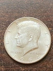 1964 D Kennedy silver half dollar a very fine coin .plus a surprise