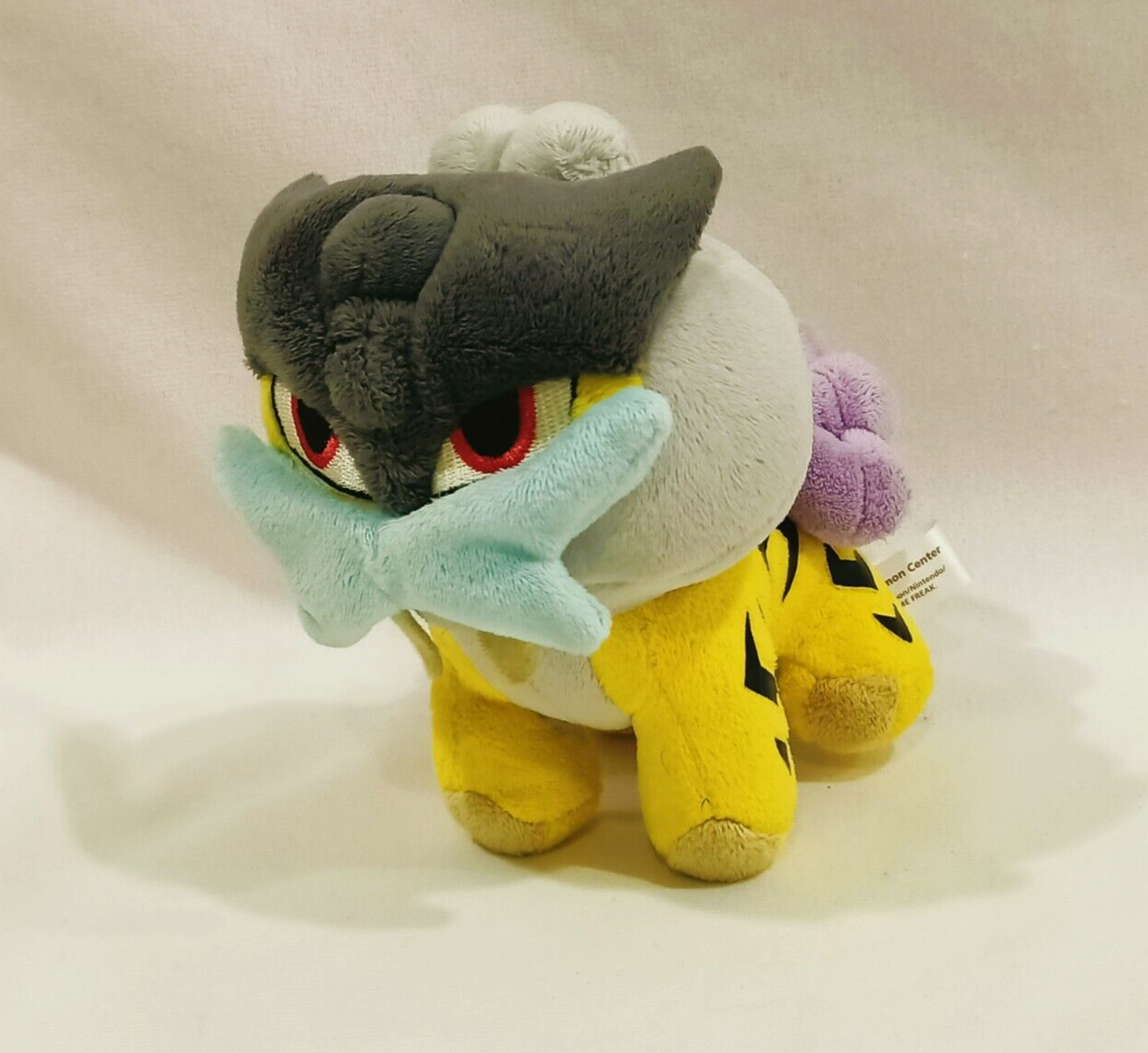 Raikou Pelúcia Pokémon Center Fit 14cm