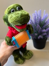 A soft plush toy of Crocodile Gena from the cartoon Cheburashka, a character