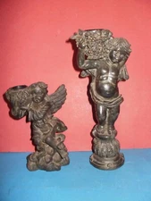 Two collectible resin candlestick  with figures of Putti/ Amours/ Cherubim, rare