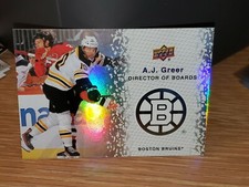 2023-24 UD Upper Deck Series 2 Director of Boards DB-2 A.J. Greer, Boston Bruins