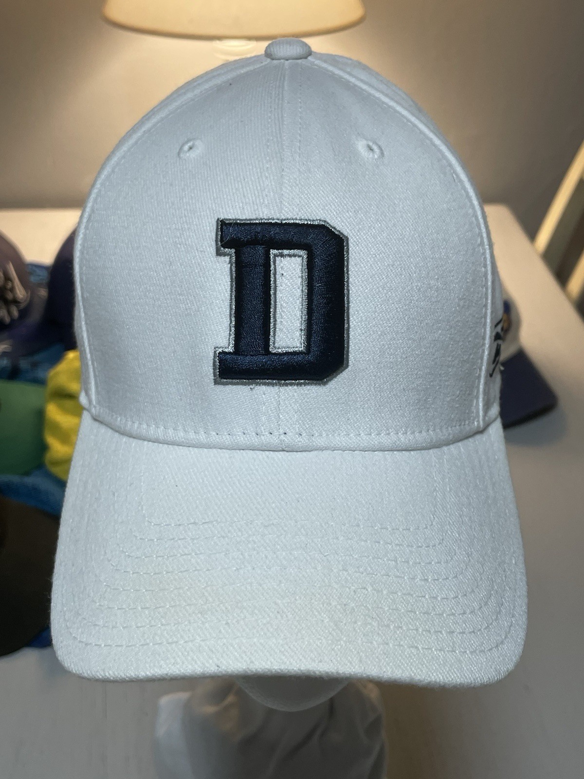 This item is a Men's White and Navy Dallas Cowboys D Logo Fitted OSFA Hat