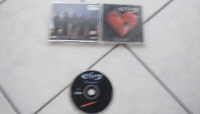 Enchant     wounded         CD   PROG   ROCK  