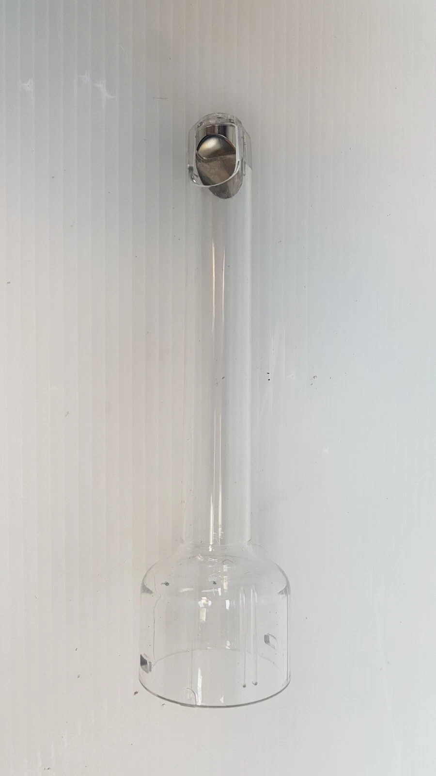 Clear Lumenis handpiece tip with metal insert at the closed end