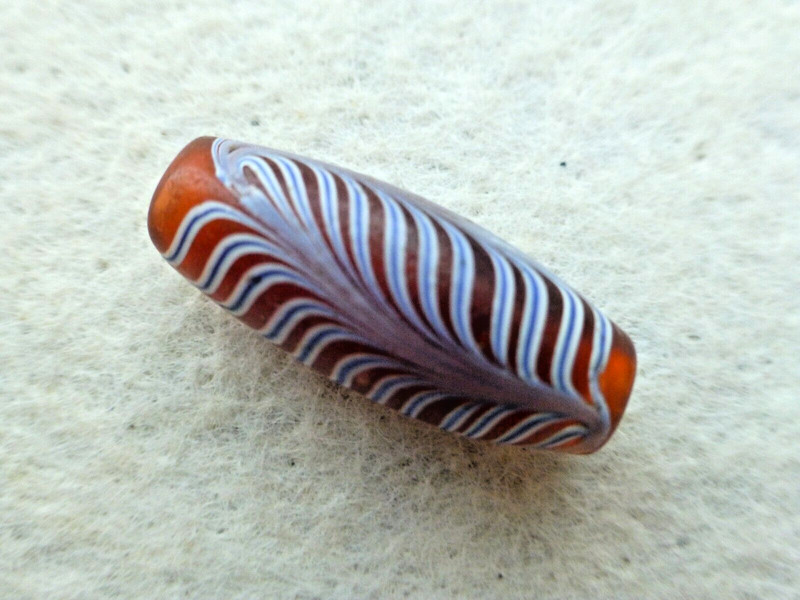 ANTIQUE TRANSLUCENT CARNELIAN  COLOR GLASS TRADE BEADS W/ WHITE & BLUE  FEATHERS