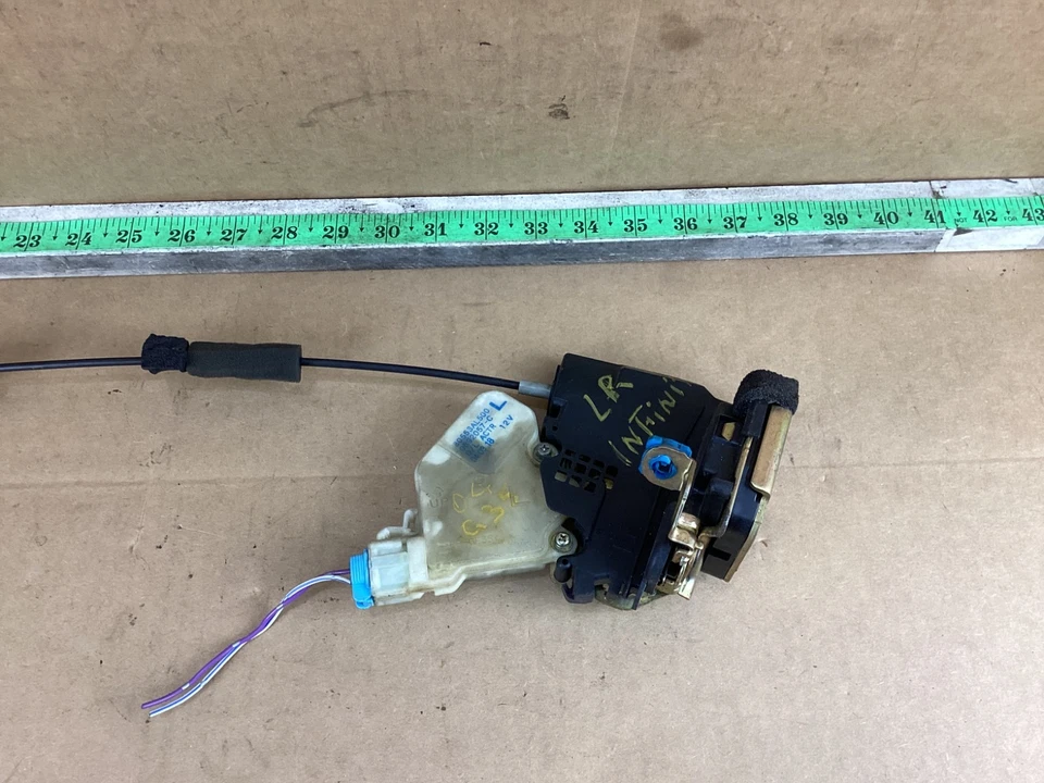 Actuador de cierre de puerta lateral izquierda trasera sedán Infiniti G35 2003-2006 80553AL500 Foto 3 de 4