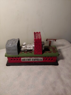 Cast Iron Orient Express Mechanical Penny Bank Steam Engine Train Excellent