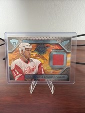 2000-01 Pacific Private Stock Titanium Game Used - Mathieu Dandenault #95 (MEM)