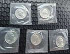 LOT OF 5-- 1964 WASHINGTON SILVER QUARTERS UNCIRCULATED STILL IN THE PLASTIC