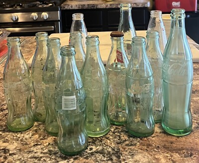 coke a cola collectibles 13 Bottles