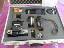 NIKON F CAMERA W/LENES,LOTS OF EXTRAS,FILM,CASE,ALUMINUM CASE,BOOKS ETC MINTY