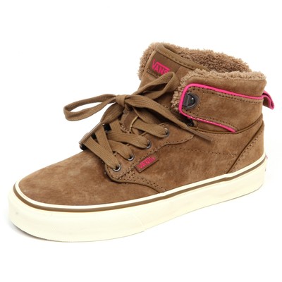 brown vans with fur in them