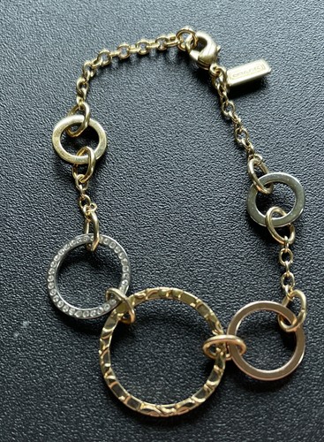 Gold tone, rose gold tone & silver tone cz COACH bracelet