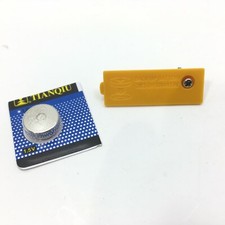 TI-84 Plus OEM Backup Battery Cover Yellow w/ LR44 1.5V Battery  Screw TI84