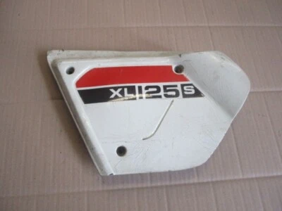 Cache latéral gauche pour Honda 125 XLS - Photo 1/2