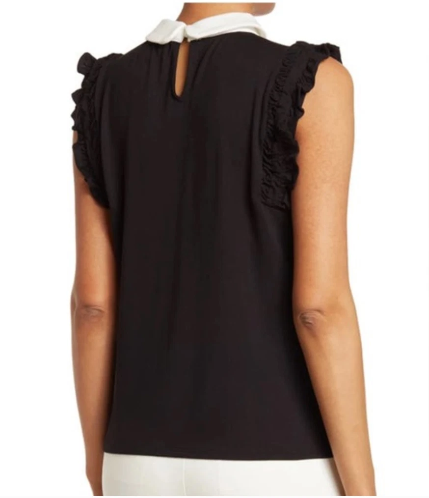 white sleeveless blouse with peter pan collar