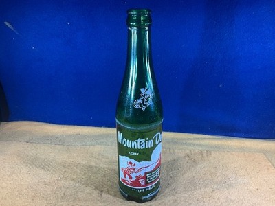 C14-27 MOUNTAIN DEW HILLBILLY SODA BOTTLE - 10oz - FILLED BY CORBY - 1 BIG CHIP