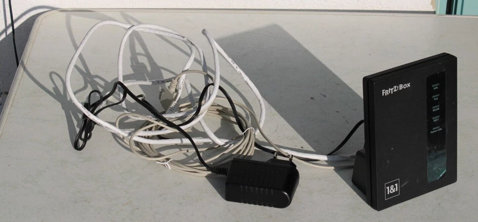 VDSL-Modem AVM FRITZ!Box 7412 (2000-2698) Schwarz, mit Netzteil und Kabeln - Bild 2 von 4