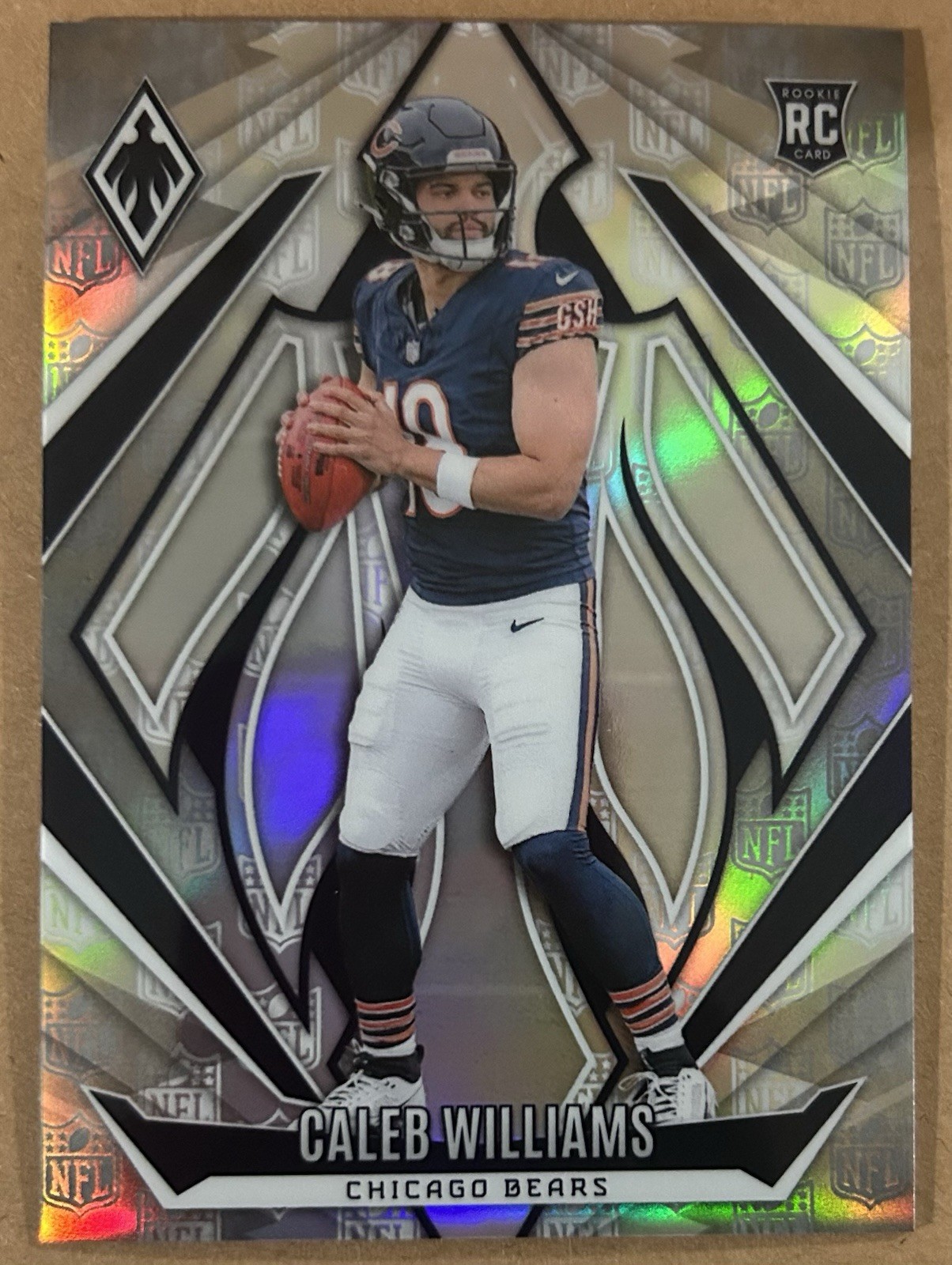 2024 Panini Phoenix - Rookies Caleb Williams #151 NFL Shield /150 (RC)