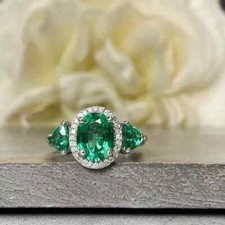 3 CT Oval Cut Lab-Created Emerald Three Stone Wedding Ring 14K White Gold Plated