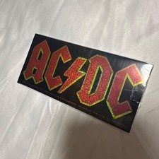 Made in 2009, out of print, official band sticker/AC/DC glitter